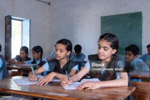 https://media.istockphoto.com/id/2075586344/photo/group-of-indian-village-students-in-school-uniform-sitting-in-classroom-doing-homework.jpg?s=2048x2048&w=is&k=20&c=__gn8KCKo4DJWnIIB9u8CYF7DPdg0m3fD37_OMDmNQ0=